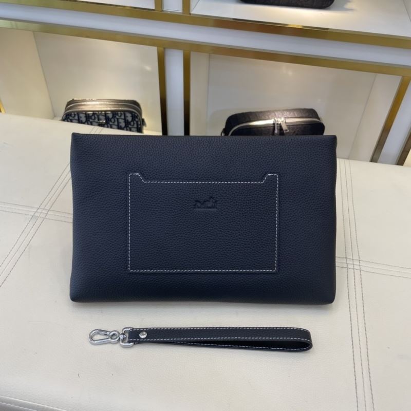 H**mes clutch bags